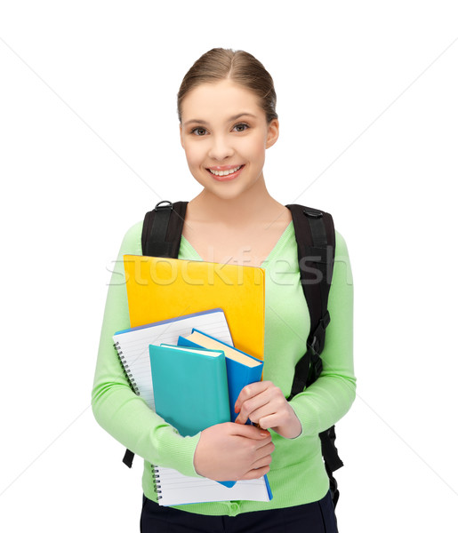 student with books and schoolbag Stock photo © dolgachov