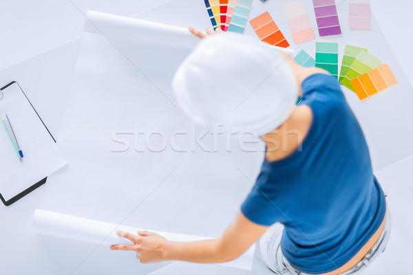 woman with color samples and blueprint Stock photo © dolgachov