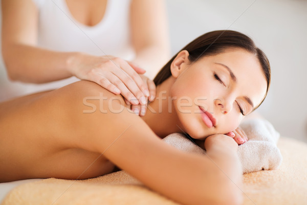 beautiful woman in spa having massage Stock photo © dolgachov