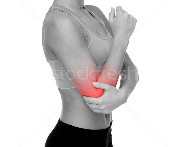Kobieta ból łokieć opieki zdrowotnej fitness Zdjęcia stock © dolgachov