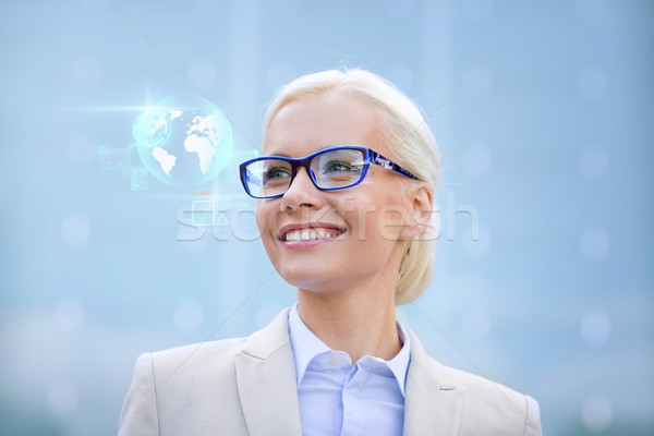 Młodych uśmiechnięty kobieta interesu okulary odkryty ludzi biznesu Zdjęcia stock © dolgachov