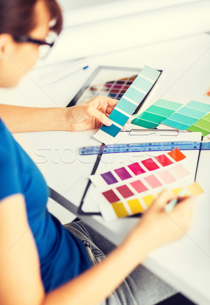 woman working with color samples for selection Stock photo © dolgachov