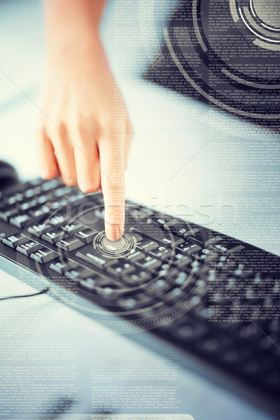 woman hand pressing on enter button Stock photo © dolgachov