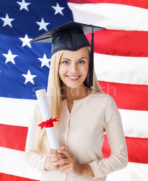 Estudante graduação boné certidão feliz bandeira americana Foto stock © dolgachov