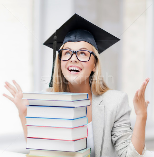 happy student in graduation cap Stock photo © dolgachov