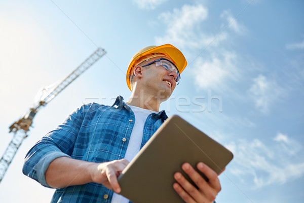 Construtor capacete de segurança construção negócio edifício Foto stock © dolgachov