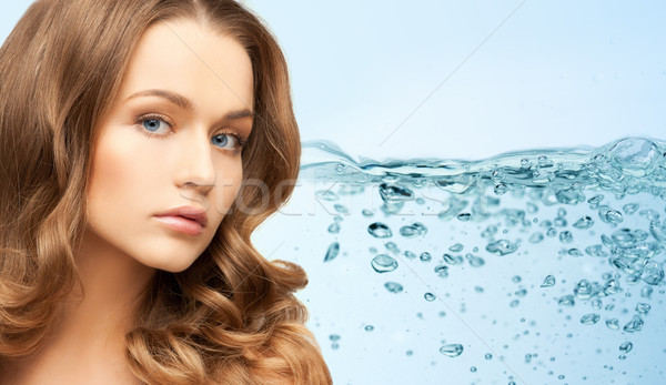 young woman face with long shiny hair Stock photo © dolgachov