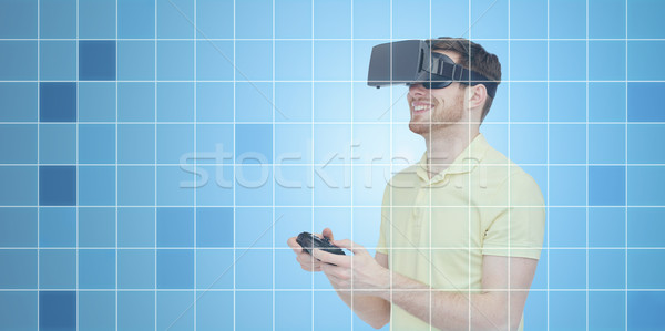 Stockfoto: Gelukkig · man · virtueel · realiteit · hoofdtelefoon · gamepad