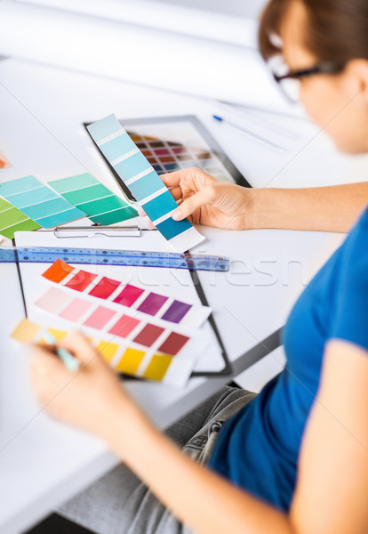 woman working with color samples for selection Stock photo © dolgachov