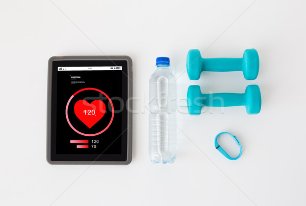 tablet pc, dumbbells, fitness tracker and bottle Stock photo © dolgachov