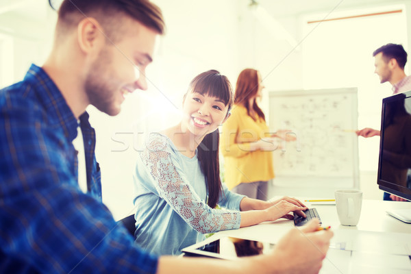 creative team with tablet pc computer at office Stock photo © dolgachov