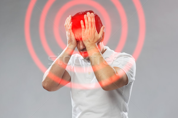 Nieszczęśliwy człowiek cierpienie głowie ból ludzi Zdjęcia stock © dolgachov