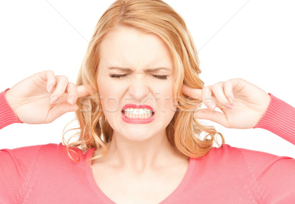 Donna dita orecchie foto stress testa Foto d'archivio © dolgachov