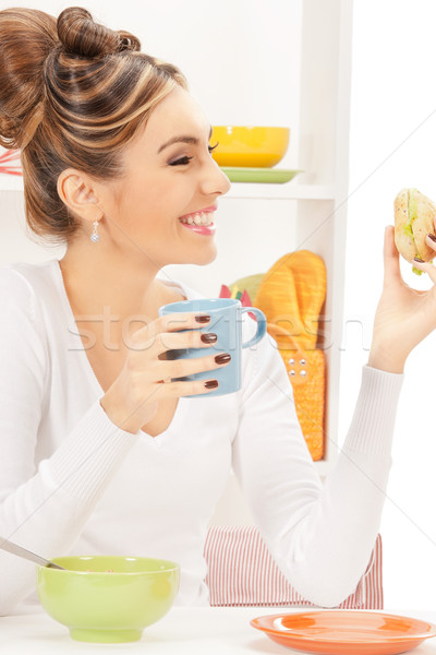lovely housewife with sandwich Stock photo © dolgachov