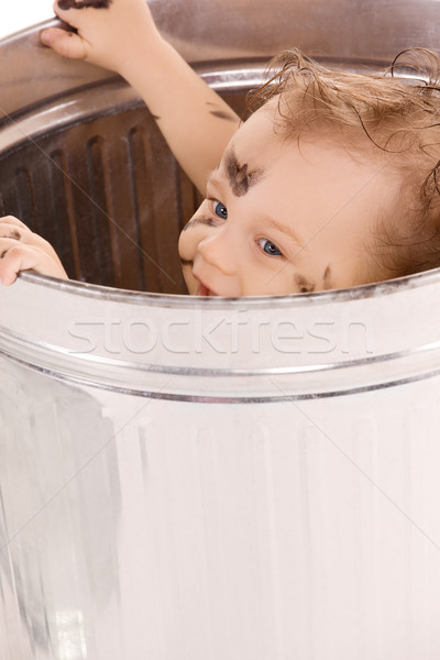 baby in trash can Stock photo © dolgachov