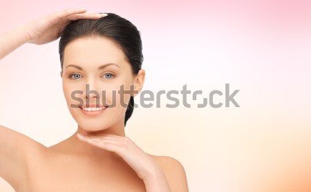 woman showing heart shape Stock photo © dolgachov