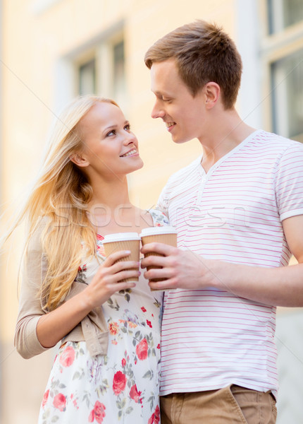couple in the city with takeaway coffee cups Stock photo © dolgachov