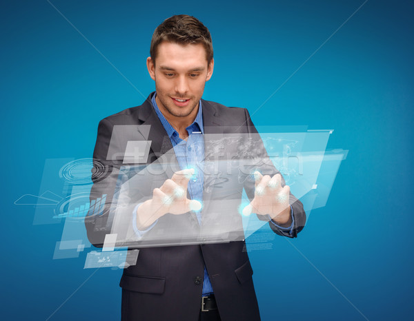 Zakenman werken denkbeeldig virtueel scherm business Stockfoto © dolgachov