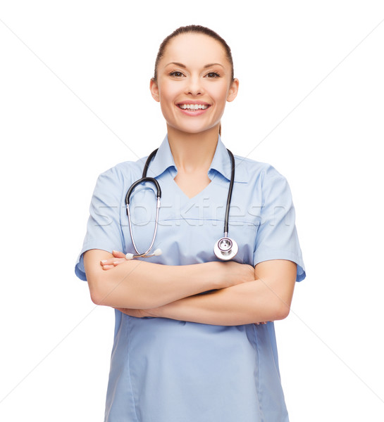 smiling female doctor or nurse with stethoscope Stock photo © dolgachov