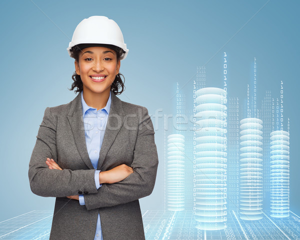 Сток-фото: деловая · женщина · белый · шлема · оружия · здании · развивающийся