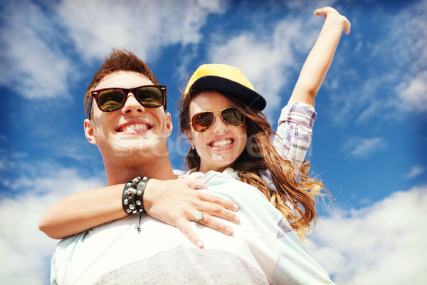 teenagers having fun outside Stock photo © dolgachov