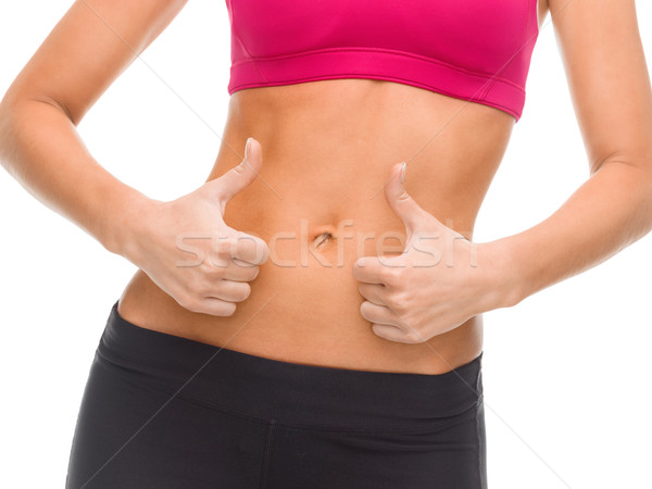 Közelkép női kezek mutat remek fitnessz Stock fotó © dolgachov