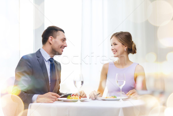 笑みを浮かべて カップル 食べ レストラン 休日 ストックフォト © dolgachov