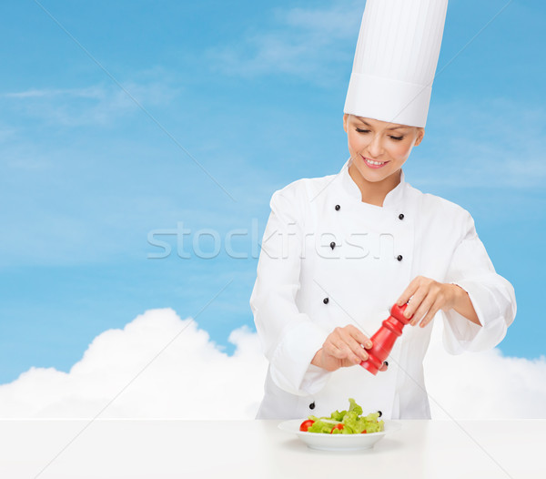 Mosolyog női szakács saláta főzés étel Stock fotó © dolgachov