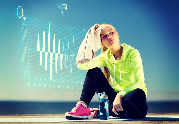 woman resting after doing sports outdoors Stock photo © dolgachov