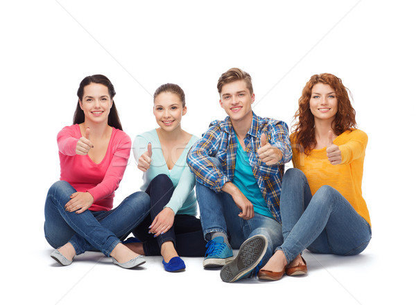 Groupe souriant adolescents amitié [[stock_photo]] © dolgachov