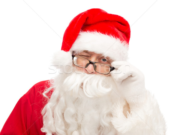 close up of santa claus winking Stock photo © dolgachov