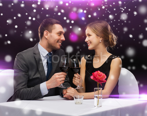 Glimlachend paar restaurant viering christmas vakantie Stockfoto © dolgachov