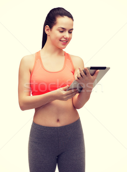 sporty woman with tablet pc computer Stock photo © dolgachov