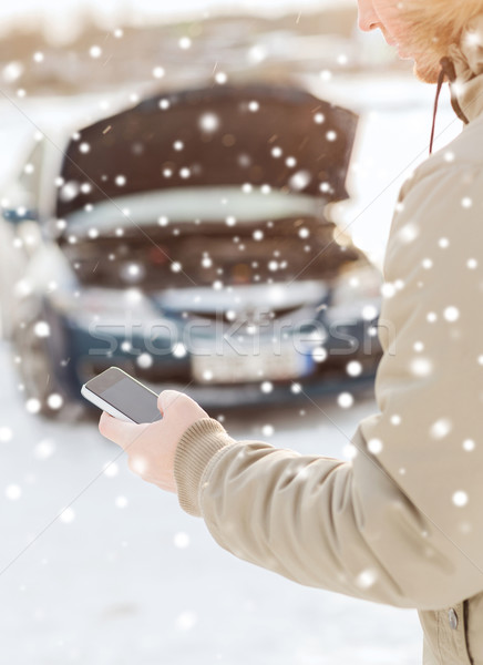 Közelkép férfi elromlott autó okostelefon közlekedés tél Stock fotó © dolgachov