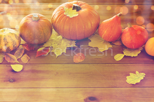Stock photo: close up of pumpkins on wooden table at home