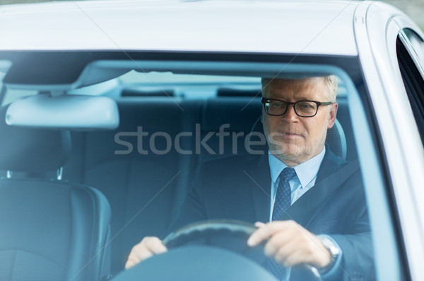 Feliz altos empresario conducción coche transporte Foto stock © dolgachov