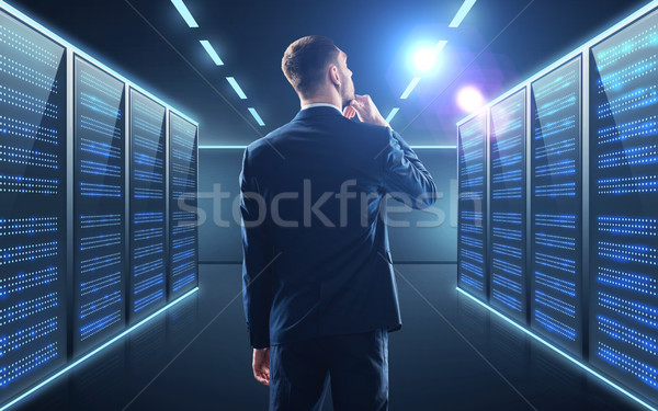 Stock photo: businessman over server room background