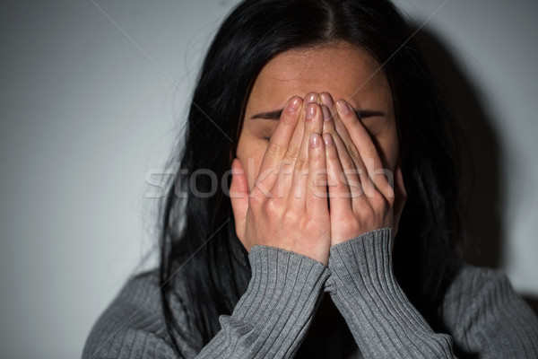close up of unhappy crying woman Stock photo © dolgachov