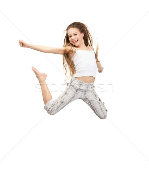 jumping teenage girl Stock photo © dolgachov