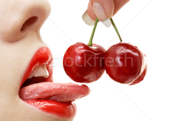Cseresznye ajkak nyelv kép fehér lány Stock fotó © dolgachov