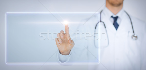 Erkek el dokunmak sanal ekran Stok fotoğraf © dolgachov