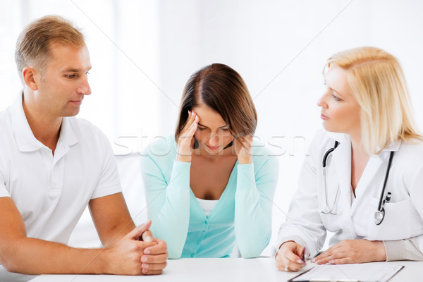 doctor with patients in cabinet Stock photo © dolgachov