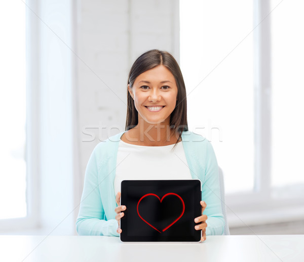 Stock photo: smiling woman with tablet pc