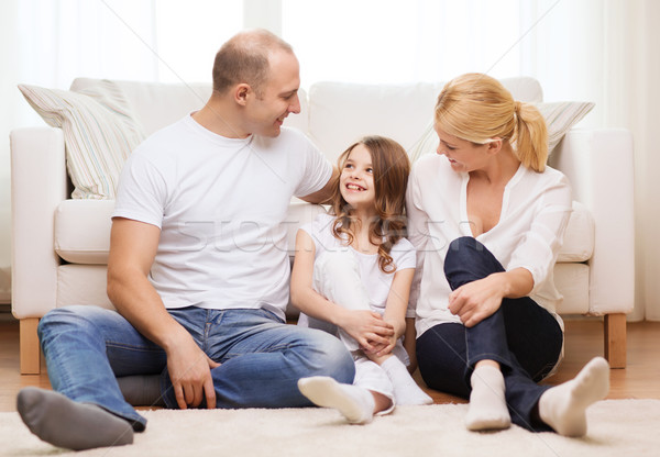 Eltern kleines Mädchen Sitzung Stock home Familie Stock foto © dolgachov