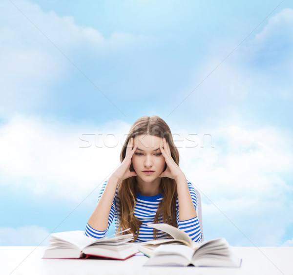 stressed student girl with books Stock photo © dolgachov