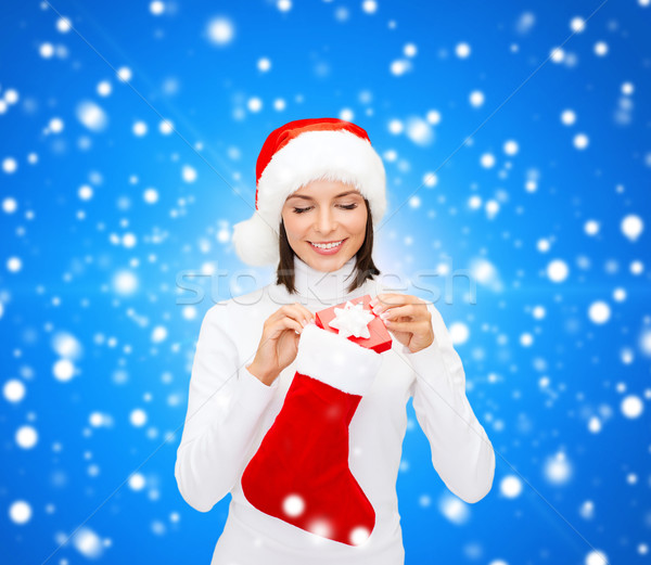 女性 サンタクロース 帽子 ギフトボックス ストッキング クリスマス ストックフォト © dolgachov