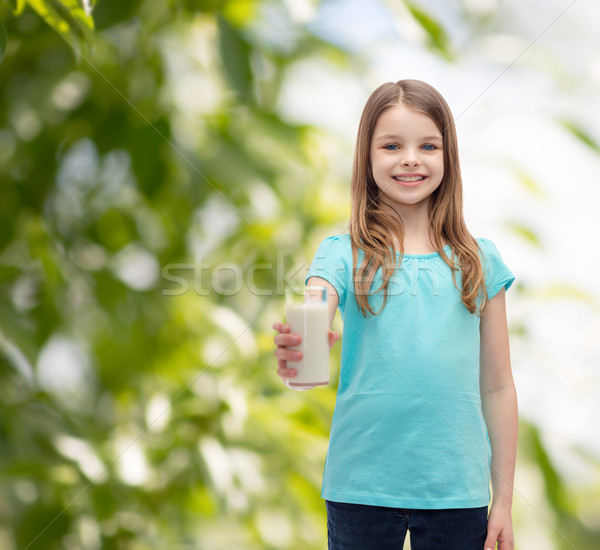 Sorridere bambina vetro latte salute bellezza Foto d'archivio © dolgachov