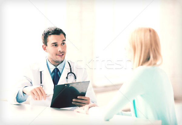 male doctor with patient Stock photo © dolgachov