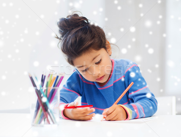 little girl with pencils drawing at home Stock photo © dolgachov