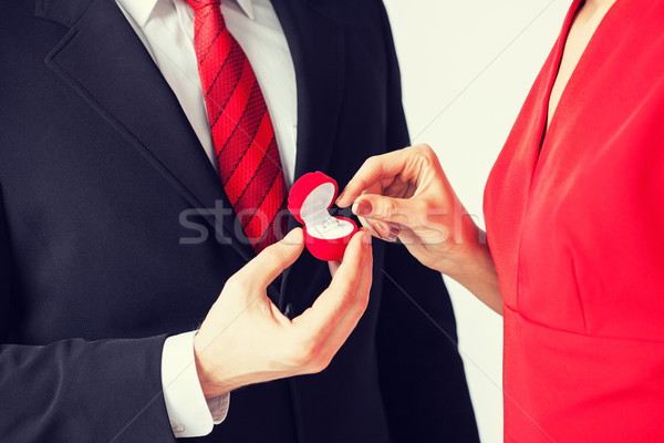couple with wedding ring and gift box Stock photo © dolgachov